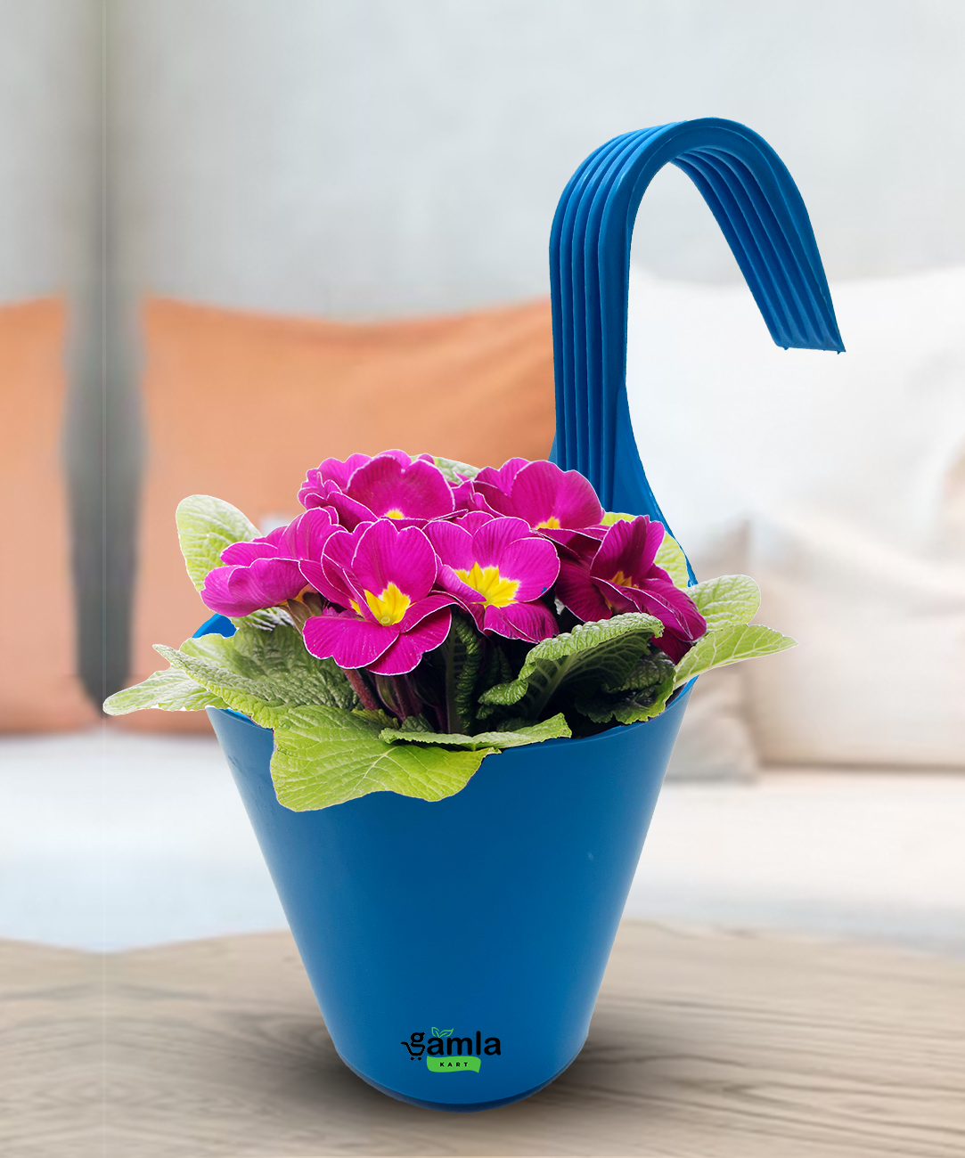 a blue vase filled with purple and purple flowers 